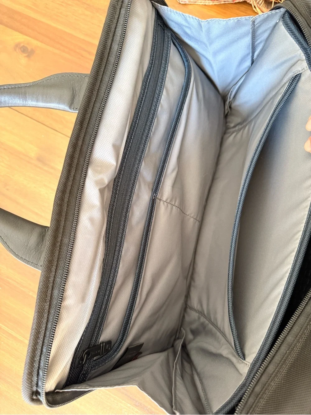 Tumi sleek black
